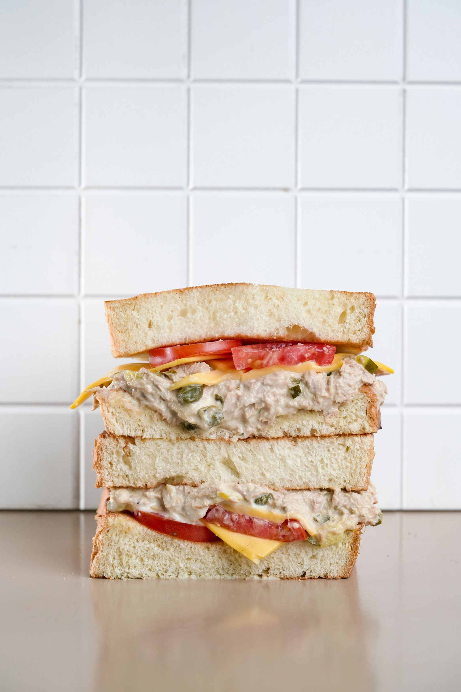 Tuna Melt — brioche, tuna, mayonnaise, capers, sour pickles